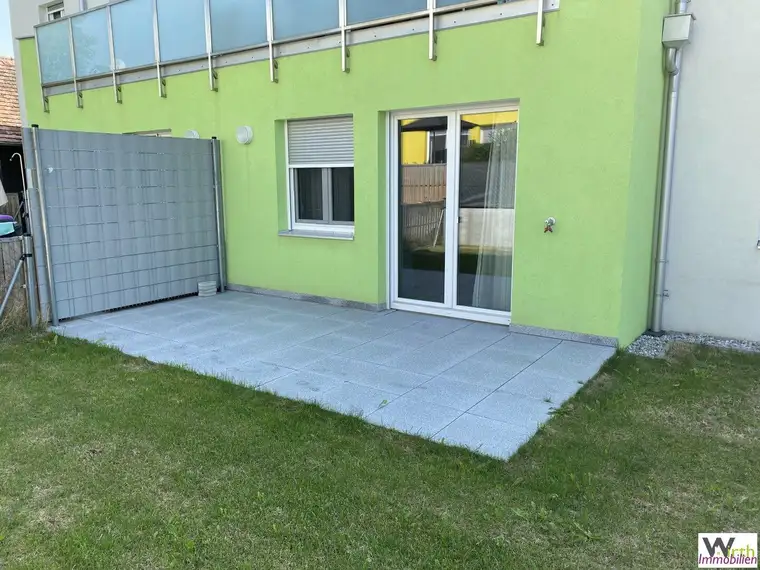 Gartenwohnung inkl. Einbauküche, Carport und großem Kellerabteil