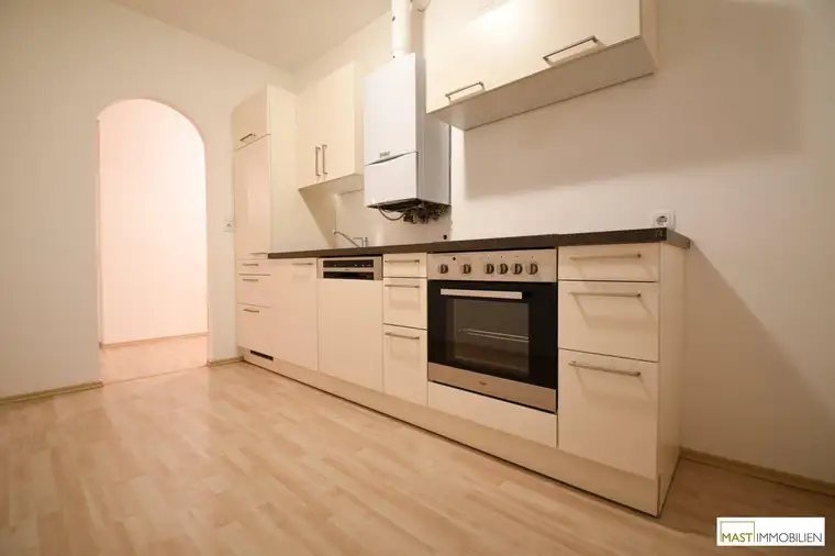 Optimal aufgeteilte 2-Zimmer Balkonwohnung in Ebergassing inkl. Neuer Küche mit Geräten und erneuerter Vaillant Therme
