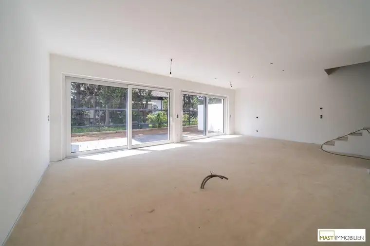 5-Zimmer Reihenhaus in Strasshof in Zentrumslage – Wohnen im Grünen bei Wien!