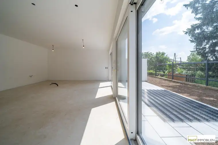 5-Zimmer Reihenhaus in Strasshof in Zentrumslage – Wohnen im Grünen bei Wien!