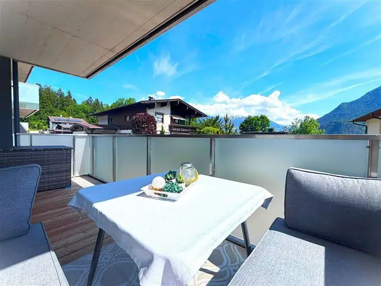Wiesing: Modernes Wohnen mit Gartenidylle – sonnige 3-Zi.-Neubauwohnung zu verkaufen