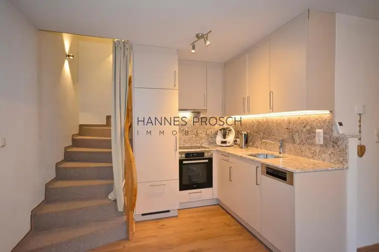 Charmante Maisonettewohnung mit Gartenanteil in Bestlage von St. Johann in Tirol