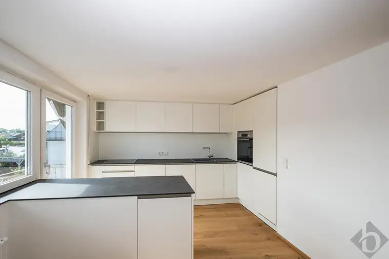 Geräumige Dachgeschoßwohnung mit Garten direkt am Mühlbach