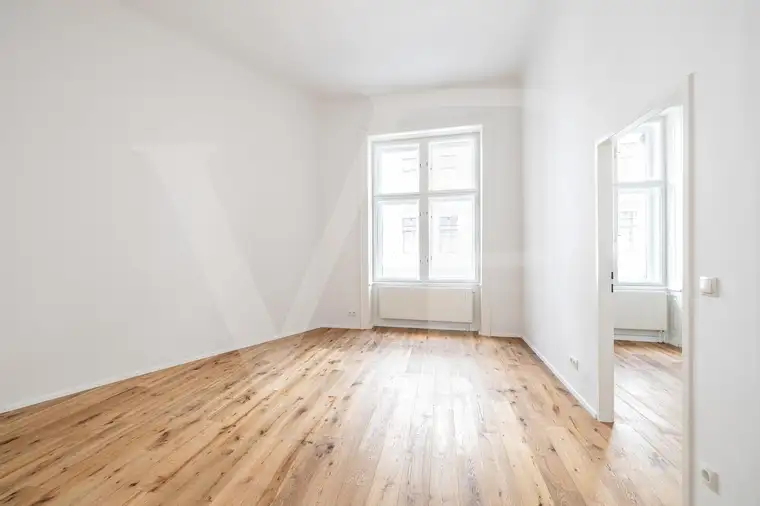 Erstbezug: 3 Zimmer Stilaltbau mit Balkon in zentraler Lage