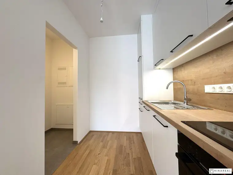 SCHULGARTENGASSE | Erstbezug - Gut geschnittene 2 Zimmer Wohnung | Loggia | Einbauküche | Elektr. Beschattung | Optional: Tiefgaragenstellplatz
