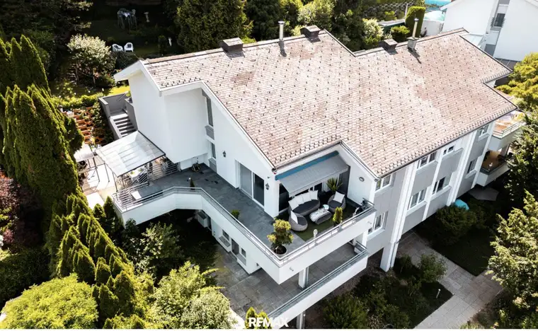 Wohntraum der Extraklasse: Exklusives Penthouse auf 2 Etagen mit großer Terrasse und schönem Garten in begehrter Lage