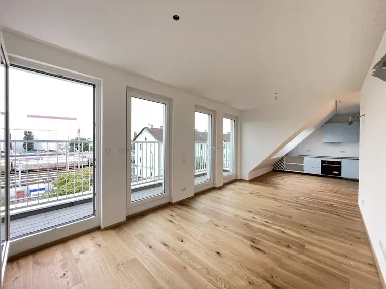 Dachgeschoss mit Balkon bei U2 / Top 14 - Wärmepumpe