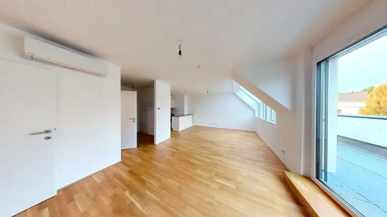 Dachgeschoß-Wohnung in Stammersdorf // Klimaanlage, Terrasse, Tiefgarage mit E-Ladestation