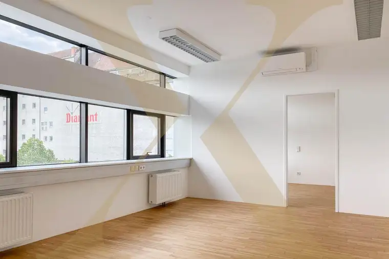 Moderne Praxis-/Bürofläche mit möglichem Tiefgaragenplatz im WDZ 7 im Zentrum von Wels/Lichtenegg zu vermieten!
