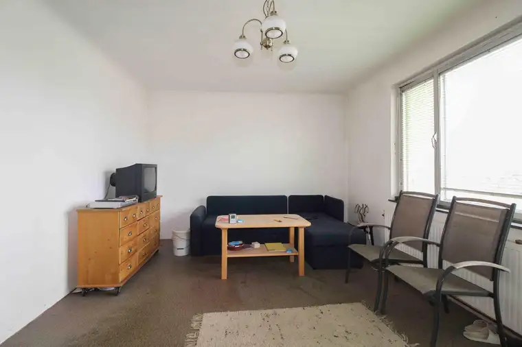 Rohjuwel: Wohnung mit 26 qm Terrasse und Entwicklungspotenzial