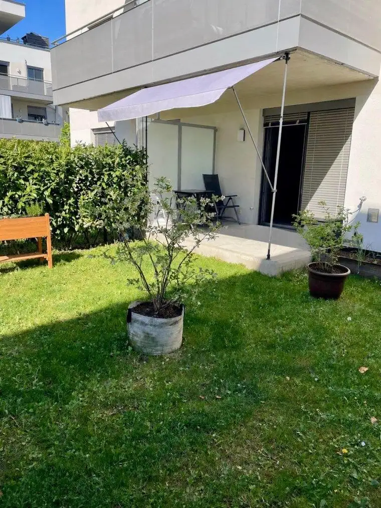 Traumhafe Gartenwohnung – moderner Wohnkomfort mit Eigengarten, Terrasse &amp; Tiefgarage