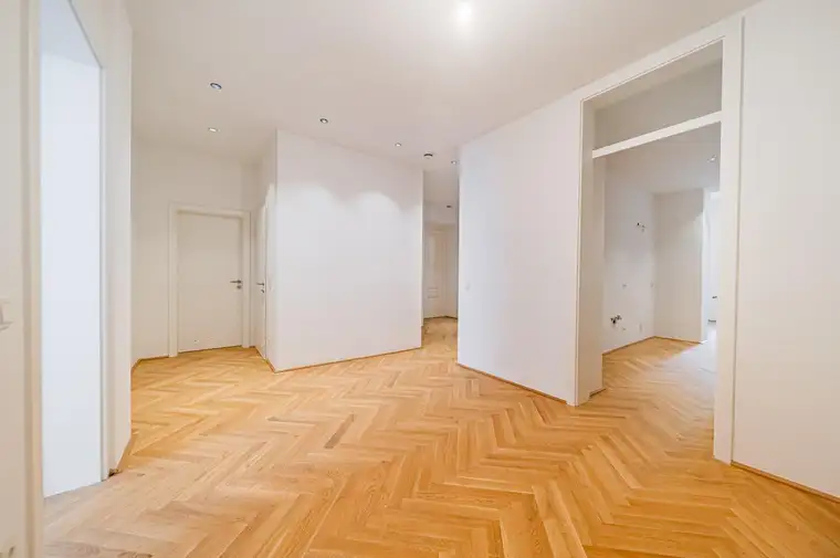 Eleganter Erstbezug: Stilvolle 2-Zimmer-Wohnung mit großzügiger Terrasse in idyllischer Ruhelage und Grünblick