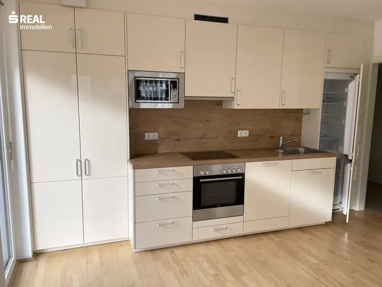 „Green City“/Neuwertige 4-Zimmer-Eckwohnung mit Südwest-Terrasse in Grünruhelage