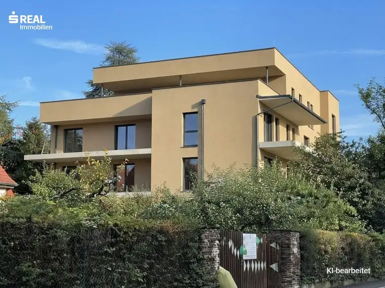 2-Zimmer Neubau mit großer Süd-Terrasse und Garten