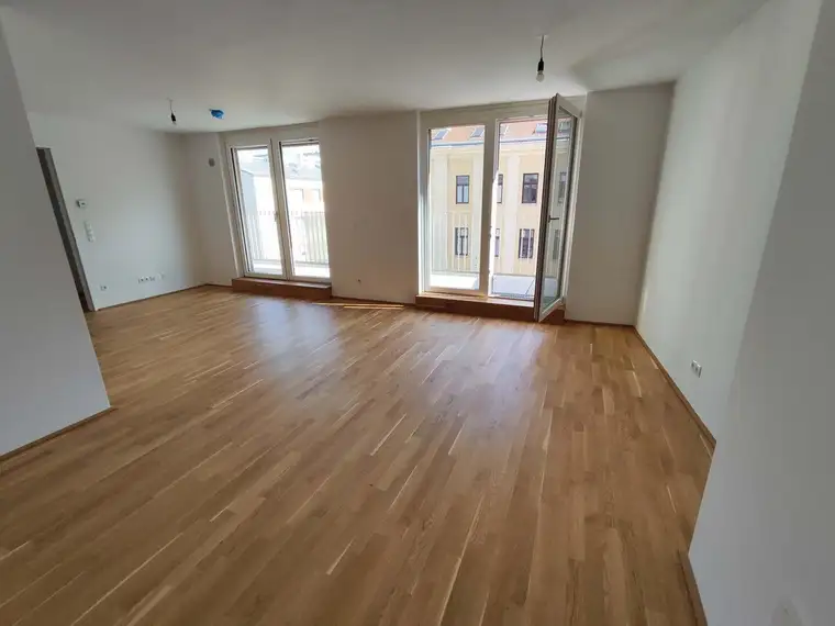 SONNIGER NEUBAU 3-Zimmer-ERSTBEZUG mit Terrasse und Balkon im 4. OG! Top 1/27