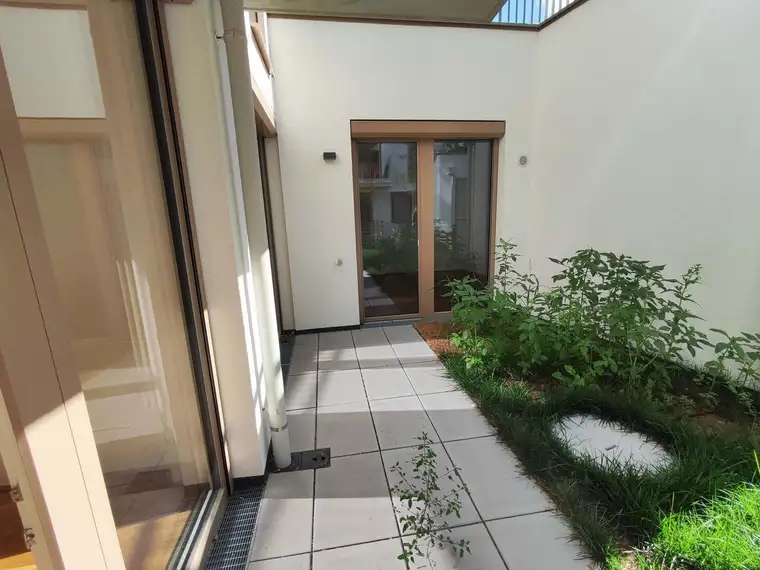RUHIGE GARTENWOHNUNG! NEUBAU 3-Zimmer-ERSTBEZUG mit Terrasse! Top 2/2