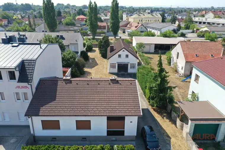 Einfamilienhaus mit großem Grundstück und vielseitigem Nebengebäude in Leobersdorf