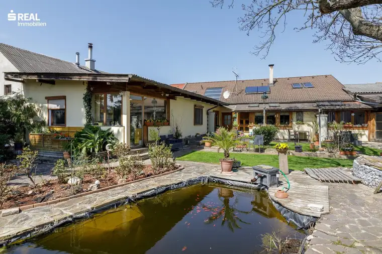 Einfamilienhaus als Wohlfühloase mit traumhaft schönem Garten