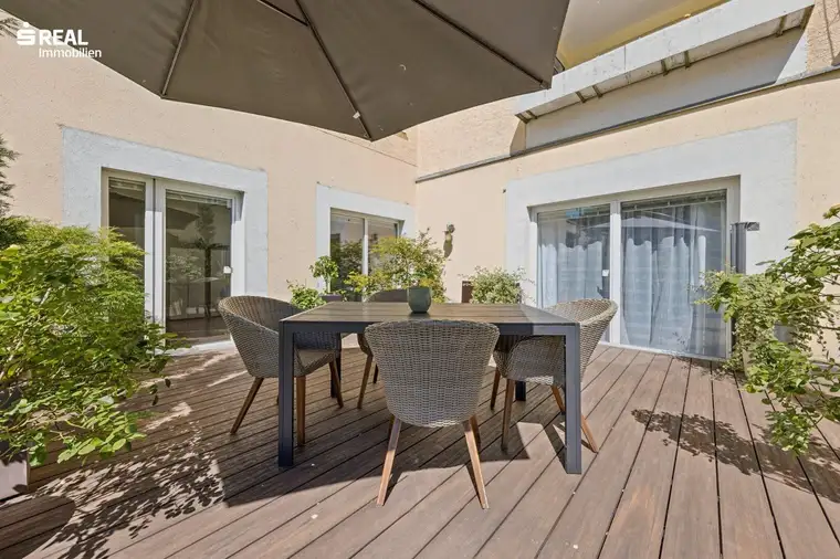 Spektakuläre Gartenwohnung mit 7 PKW-Stellplätzen