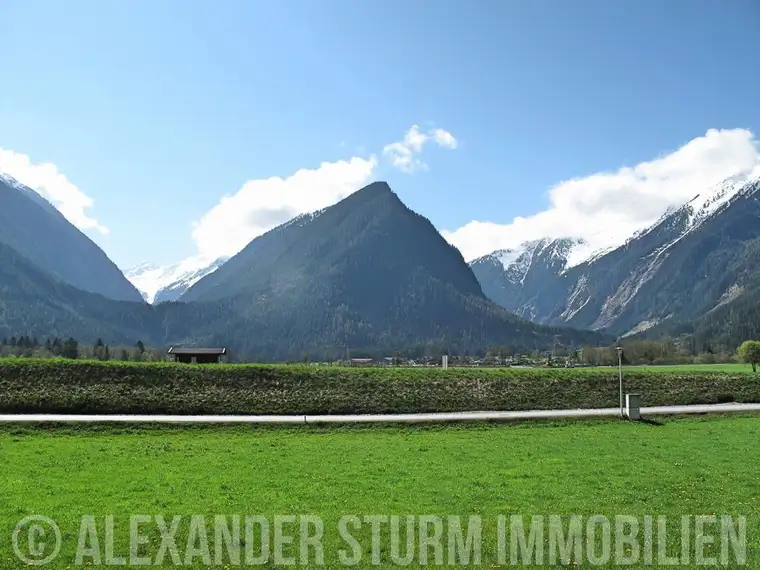 Sonniges Baugrundstück mit traumhafter Bergkulisse inmitten der Ferienregion Wildkogel