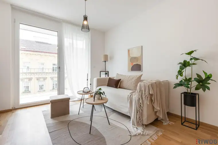 ERSTBEZUG mit ca. 7 m² BALKON | 2-Zimmer Neubau | Fernwärme | TG-Stellplatz optional | Nachhaltiges Wohnbauprojekt