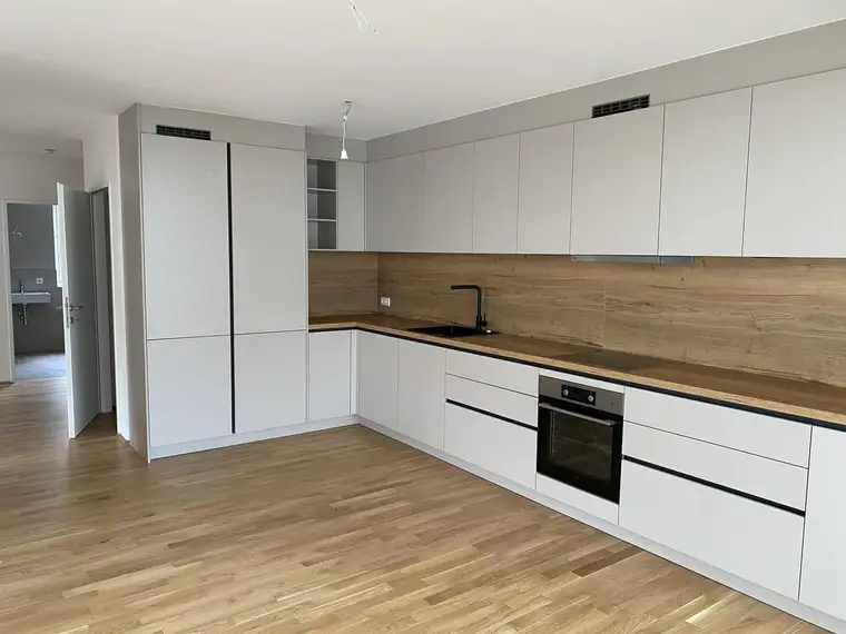 (AW06) Helle 3-Zimmer-Neubauwohnung mit 2 Tiefgaragenabstellplätzen 