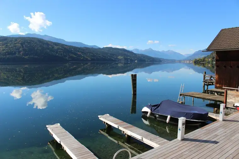 EIN TRAUM WIRD WAHR! HOCHWERTIG AUSGESTATTETE GARTENWOHNUNG MIT MAGISCHEM AUSBLICK UND SEEGRUNDSTÜCK AM WUNDERSCHÖNEN MILLSTÄTTER SEE!