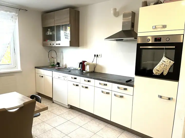 Großzügige 3-Zimmer Eigentumswohnung mit Einzelgarage in zentraler Lage