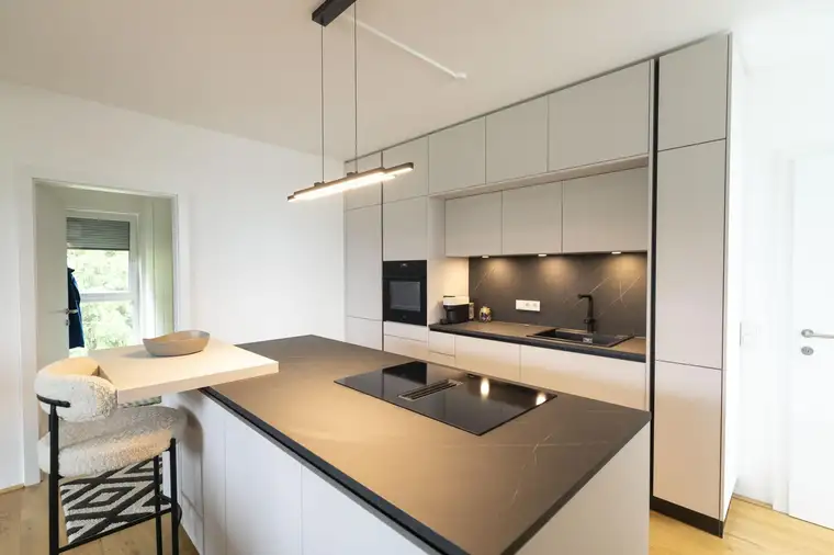 Dachgeschosswohnung mit schönem Ausblick – TG-Stellplatz inklusive