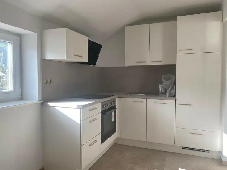 Wohnung im OG mit Parkplatz und eigenem Garten!