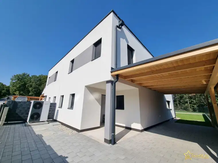 IDEAL FÜR FAMILIEN! 5-ZIMMER-ZIEGELHAUS MIT UNVERBAUBAREN AUSBLICK. MIT KELLER, BALKON, TERRASSE, CARPORT UND GROSSEM GARTEN.