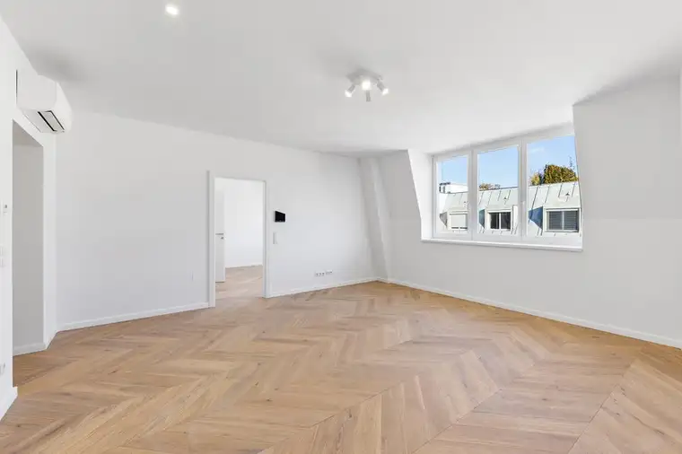 Elegante Dachgeschosswohnung: Luxuriöses Wohnen über den Dächern Wiens