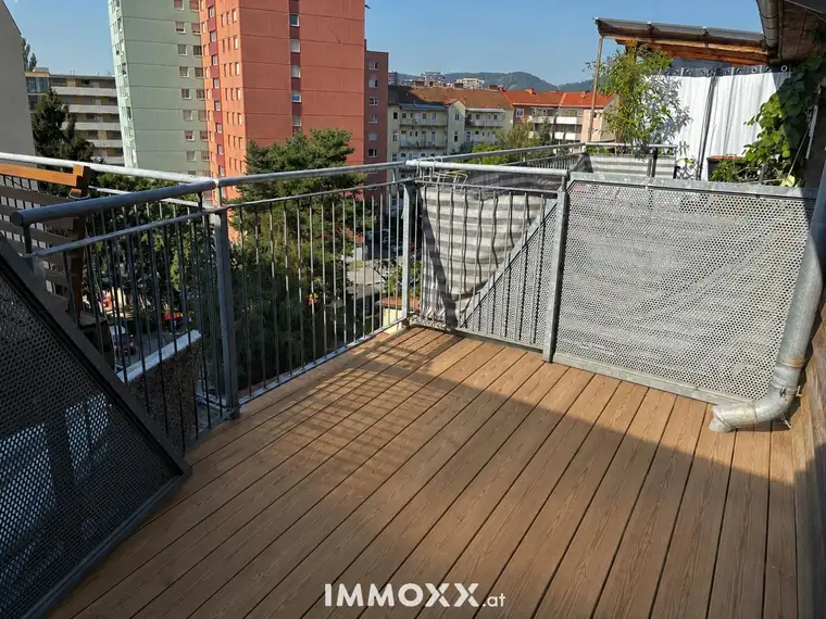 Charmante Galeriewohnung mit sonniger Dachterrasse in ruhiger Lage