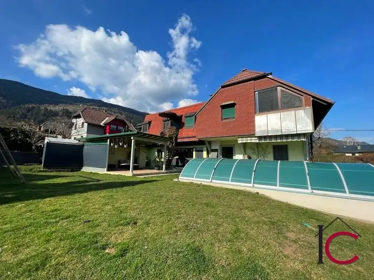 Gepflegtes Zweifamilienhaus mit Pool in familienfreundlicher, Sonnen-Aussichtslage in Bodensdorf