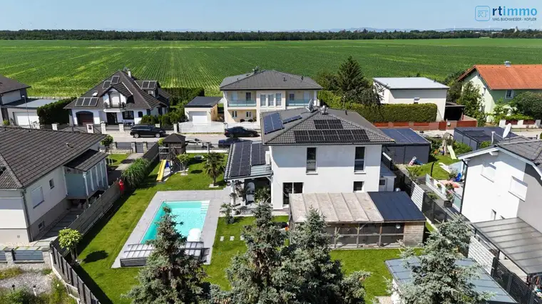 "EIN HAUS, DAS ALLE STÜCKERL SPIELT" - ENERGIEEFFIZIENTES HAUS MIT 4 ZIMMERN, SWIMMINGPOOL, RIESIGEM KELLER UND KLIMAANLAGE