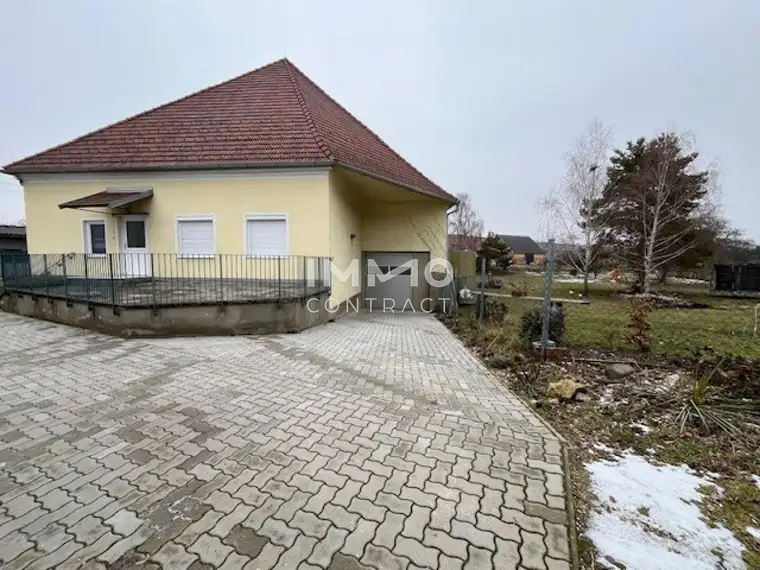 82 m² helle Zimmerwohnung mit einen großen Garten und Garage