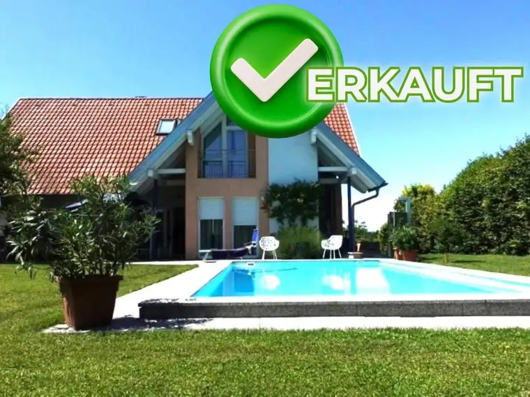 WILHERING: Perfekt aufgeteiltes Wohnhaus mit XL- Garage, Pool auf einem hervorragenden Grundstück mit ca. 1.069m²