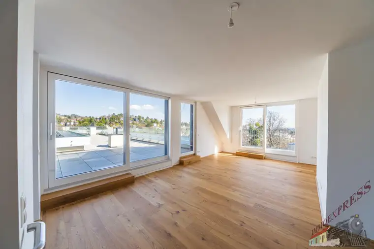 Atemberaubender Panoramablick – luxuriöse 3,5-Zimmer-Dachgeschosswohnung mit 96 m² Dachterrasse