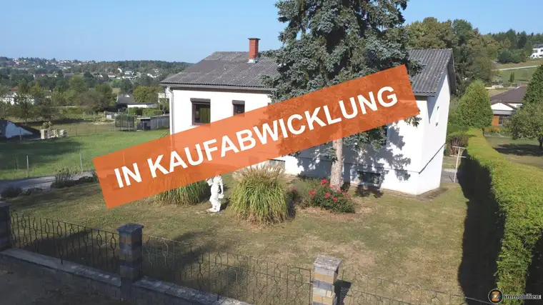Unterkellertes Einfamilienhaus mit Garage in schöner Wohnlage