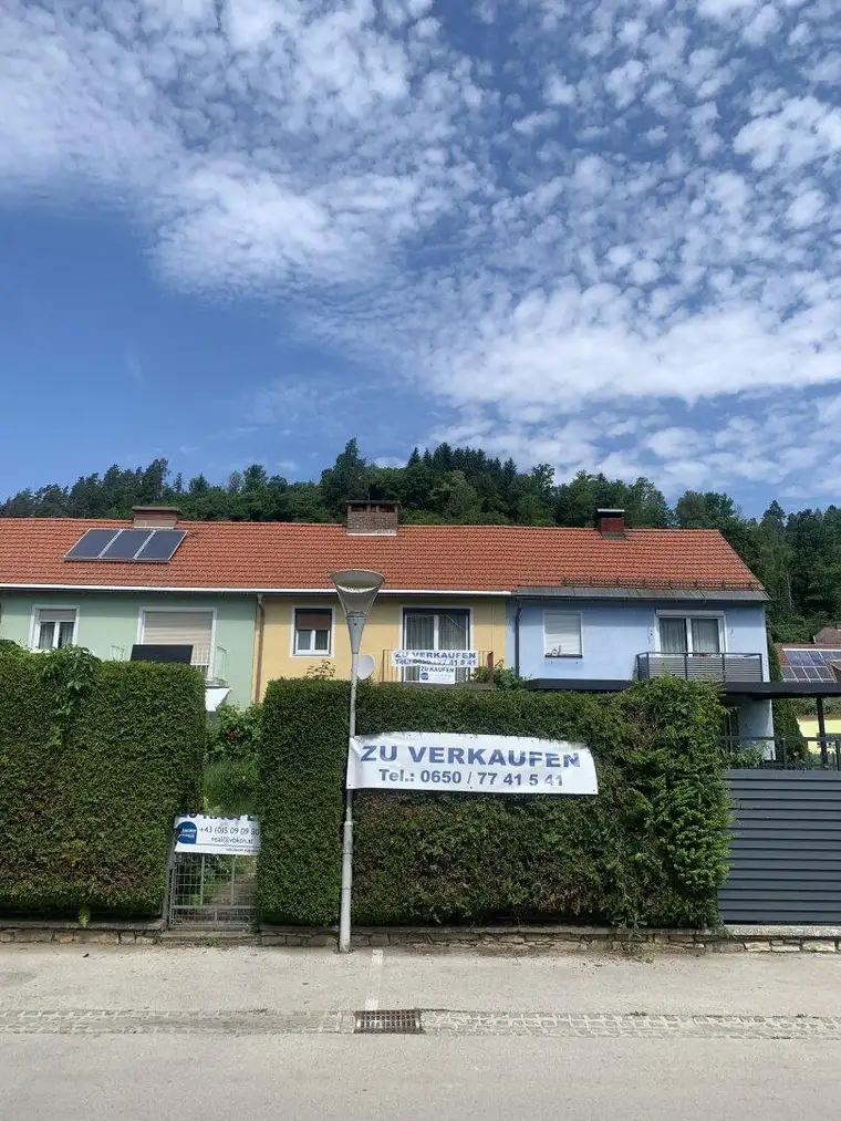 Reihenhaus mit Grünfläche und Wintergarten