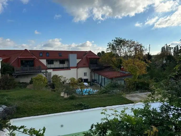 Luxuriös wohnen in den Weinbergen – Exklusive 3-Zimmer-Wohnung mit Gartenblick