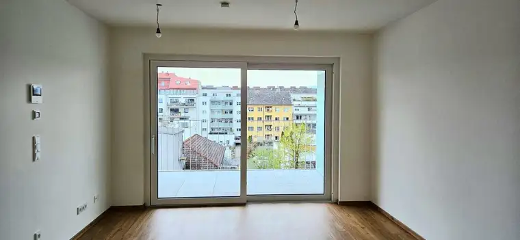 Singel oder Pärchenwohnung Stadtzentrum mit 80 m2 Garten, 11 m2 Terasse TG Platz-ERSTBEZUG