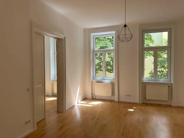 Charmanter Stilaltbau-Flair mit Grünblick mitten in der City - Wohnen mitten im 9. Bezirk.