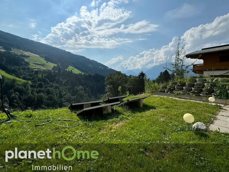 Einzigartige Gelegenheit: Panorama-Gartenwohnung mit Bergblick 