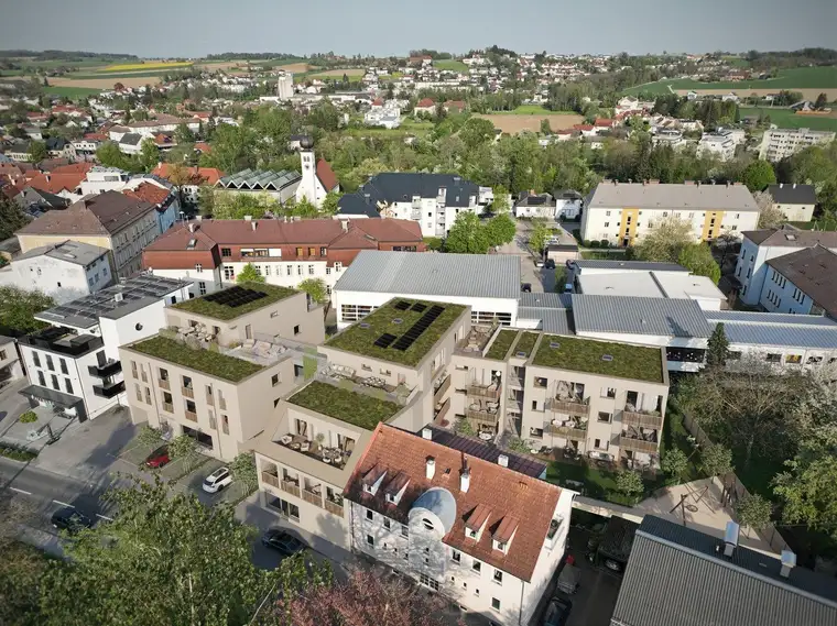 Moderne 2-Zimmer Eigentumswohnung mit Balkon, großer Glasfront und Tiefgaragenstellplatz im Zentrum von Neuhofen