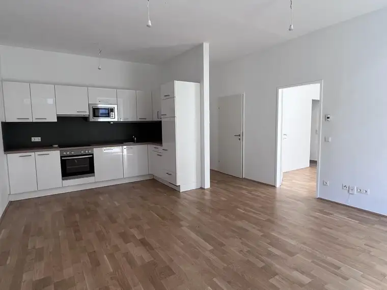 Erstklassige 2 Zimmerwohnung mit 15 m² Garten | LEO19 | Top 1.1