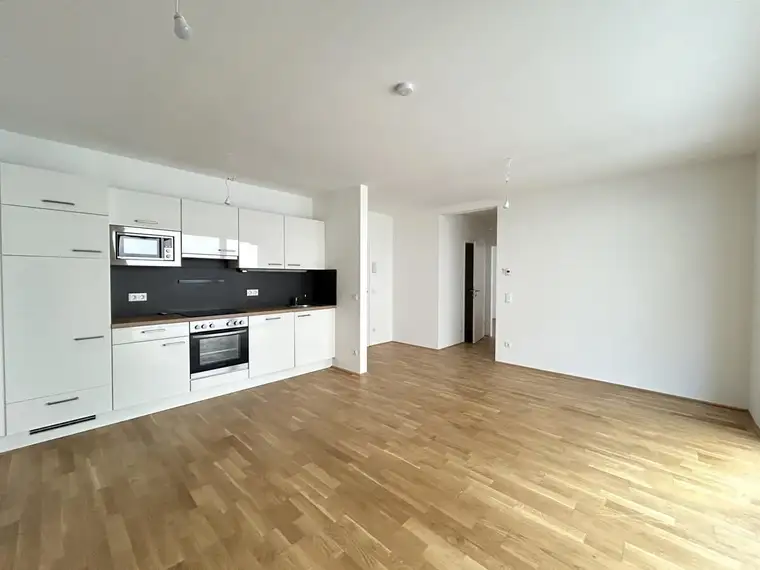 Erstklassige 2 Zimmerwohnung mit 62 m² Garten | LEO19 | Top 3.4