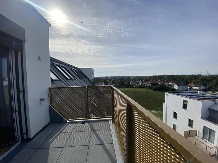 Photovoltaik &amp; Erdwärmepumpe | 4-Zimmer-Dachgeschosswohnung | Kühlung mit Betonkernaktivierung | Top 84