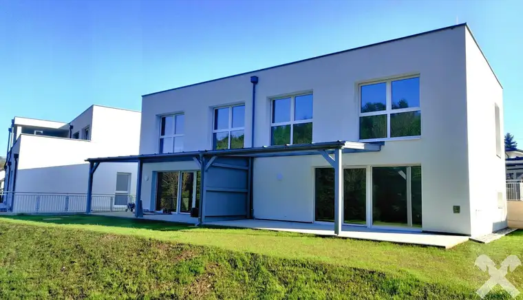 Schlüsselfertiges Neubau-Reihenwohnhaus mit Eigengarten in attraktiver Wohnlage