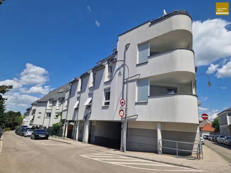 4-Zimmer-Gartenwohnung mit Tiefgaragenplatz in TOPLAGE - Nähe Rathausplatz
